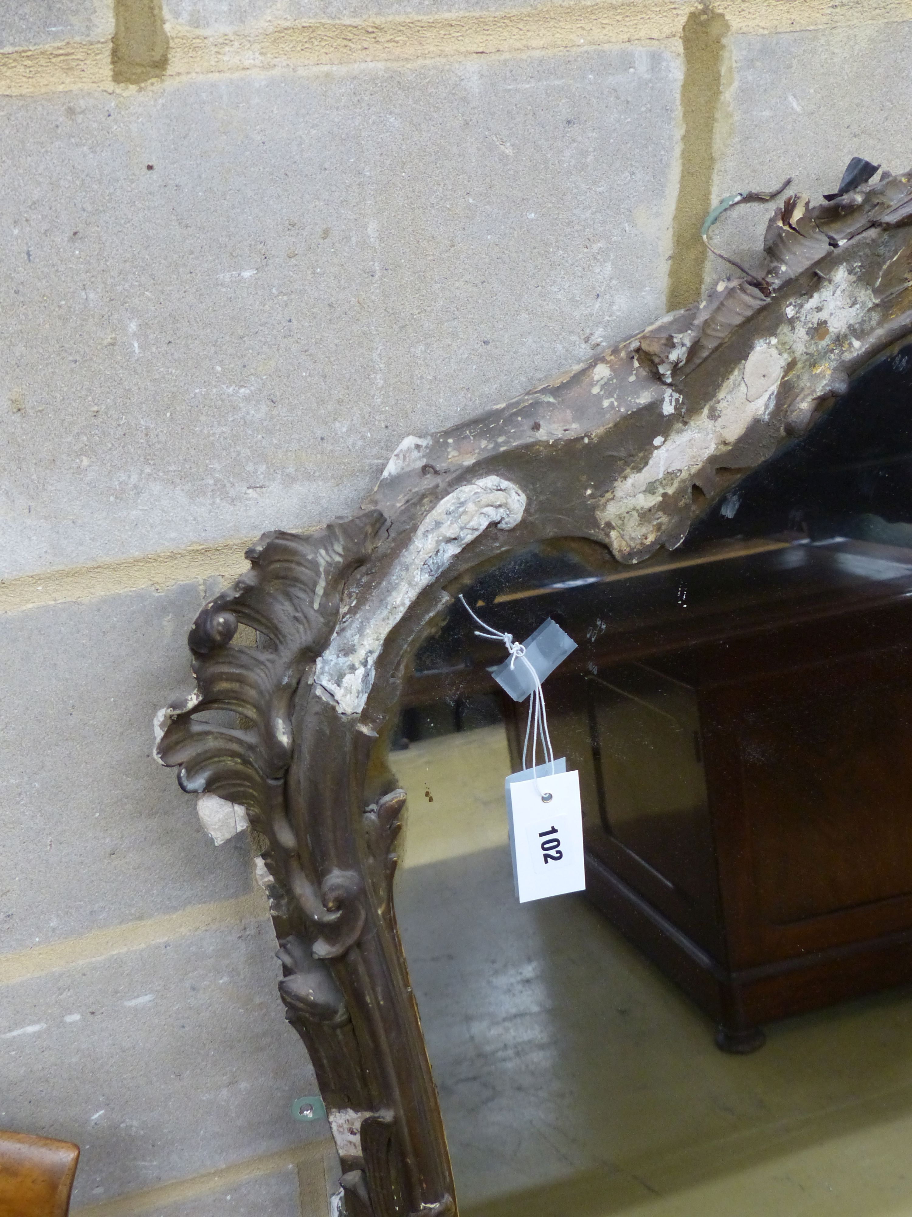 A Victorian carved and giltwoodovermantel mirror (a.f), width 152cm